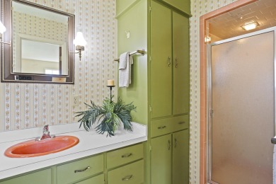 Lakefront Living... Welcome home to this 3BD / 2BA with separate on Pine Creek Golf Club in Mississippi - for sale on GolfHomes.com, golf home, golf lot