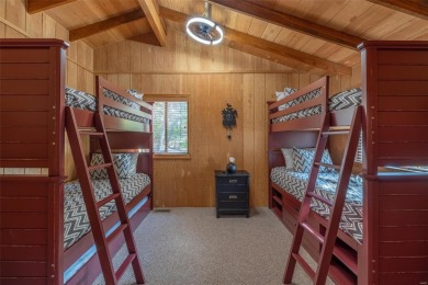 This stunning, fully furnished 4 bed and 2 bath lakefront chalet on Innsbrook Resort Golf Course in Missouri - for sale on GolfHomes.com, golf home, golf lot