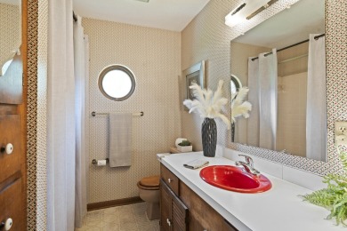 Lakefront Living... Welcome home to this 3BD / 2BA with separate on Pine Creek Golf Club in Mississippi - for sale on GolfHomes.com, golf home, golf lot
