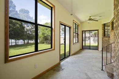 Lakefront Living... Welcome home to this 3BD / 2BA with separate on Pine Creek Golf Club in Mississippi - for sale on GolfHomes.com, golf home, golf lot