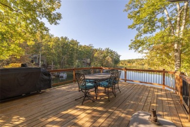 This stunning, fully furnished 4 bed and 2 bath lakefront chalet on Innsbrook Resort Golf Course in Missouri - for sale on GolfHomes.com, golf home, golf lot