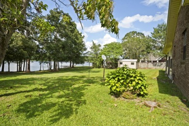 Lakefront Living... Welcome home to this 3BD / 2BA with separate on Pine Creek Golf Club in Mississippi - for sale on GolfHomes.com, golf home, golf lot