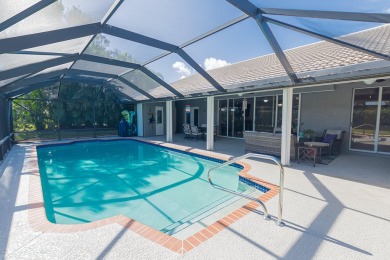 Indulge in Luxury Living in Country Club Estates! This stunning on St. Lucie Trail Golf Club in Florida - for sale on GolfHomes.com, golf home, golf lot