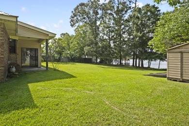 Lakefront Living... Welcome home to this 3BD / 2BA with separate on Pine Creek Golf Club in Mississippi - for sale on GolfHomes.com, golf home, golf lot