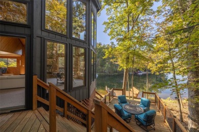 This stunning, fully furnished 4 bed and 2 bath lakefront chalet on Innsbrook Resort Golf Course in Missouri - for sale on GolfHomes.com, golf home, golf lot