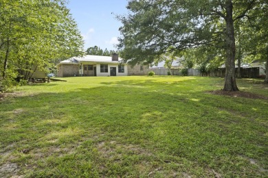 Lakefront Living... Welcome home to this 3BD / 2BA with separate on Pine Creek Golf Club in Mississippi - for sale on GolfHomes.com, golf home, golf lot