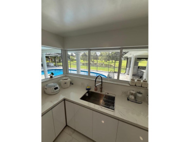 Desirable location COUNTRY CLUB OF MIAMI with stunning golf on  in Florida - for sale on GolfHomes.com, golf home, golf lot