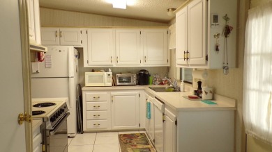 Here is a nice quaint 2 bedroom Home in a very friendly on Schalamar Creek Golf and Country Club in Florida - for sale on GolfHomes.com, golf home, golf lot