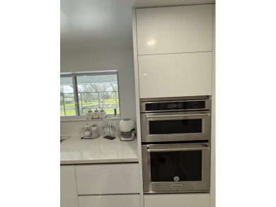 Desirable location COUNTRY CLUB OF MIAMI with stunning golf on  in Florida - for sale on GolfHomes.com, golf home, golf lot