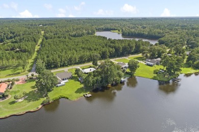 Lakefront Living... Welcome home to this 3BD / 2BA with separate on Pine Creek Golf Club in Mississippi - for sale on GolfHomes.com, golf home, golf lot
