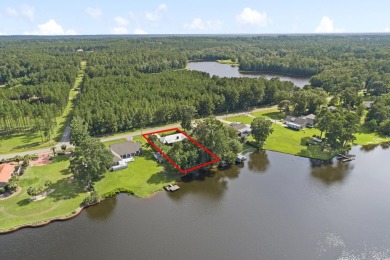 Lakefront Living... Welcome home to this 3BD / 2BA with separate on Pine Creek Golf Club in Mississippi - for sale on GolfHomes.com, golf home, golf lot