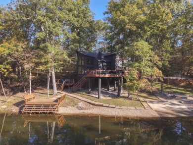 This stunning, fully furnished 4 bed and 2 bath lakefront chalet on Innsbrook Resort Golf Course in Missouri - for sale on GolfHomes.com, golf home, golf lot