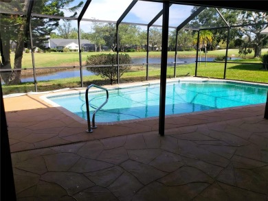 PRICE ADJUSTMENT! A wonderful pool home located in East Lake on East Lake Woodlands Country Club in Florida - for sale on GolfHomes.com, golf home, golf lot