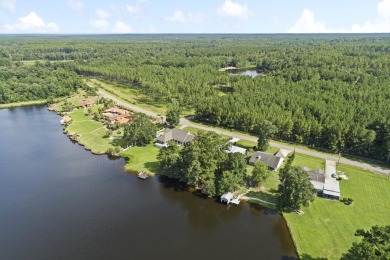 Lakefront Living... Welcome home to this 3BD / 2BA with separate on Pine Creek Golf Club in Mississippi - for sale on GolfHomes.com, golf home, golf lot