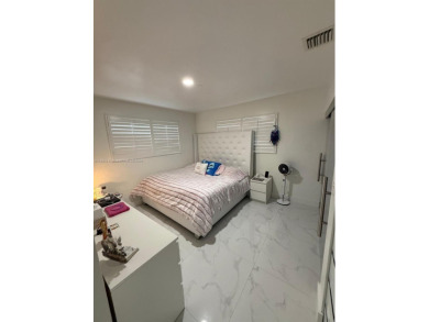 Desirable location COUNTRY CLUB OF MIAMI with stunning golf on  in Florida - for sale on GolfHomes.com, golf home, golf lot