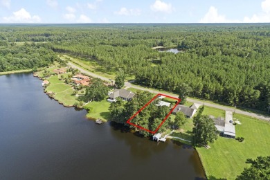 Lakefront Living... Welcome home to this 3BD / 2BA with separate on Pine Creek Golf Club in Mississippi - for sale on GolfHomes.com, golf home, golf lot