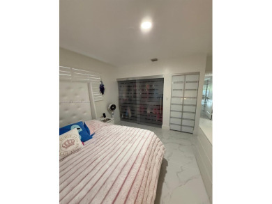 Desirable location COUNTRY CLUB OF MIAMI with stunning golf on  in Florida - for sale on GolfHomes.com, golf home, golf lot
