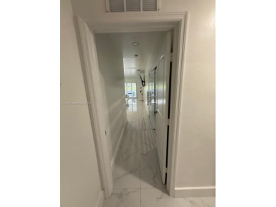 Desirable location COUNTRY CLUB OF MIAMI with stunning golf on  in Florida - for sale on GolfHomes.com, golf home, golf lot