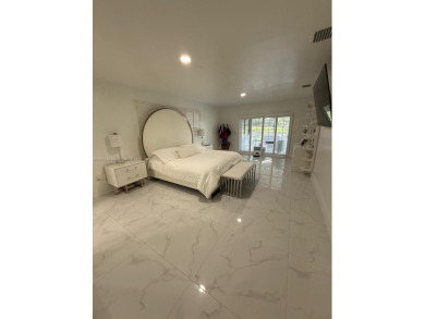 Desirable location COUNTRY CLUB OF MIAMI with stunning golf on  in Florida - for sale on GolfHomes.com, golf home, golf lot