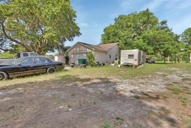Peaceful Country Setting with City Access - Osteen, FL . This on Cypress Point RV Golf Club in Florida - for sale on GolfHomes.com, golf home, golf lot