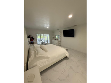 Desirable location COUNTRY CLUB OF MIAMI with stunning golf on  in Florida - for sale on GolfHomes.com, golf home, golf lot