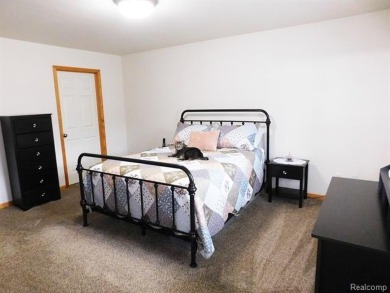 Immaculate and lovingly cared for home featuring 3 bedrooms and on Maple Lane Golf Club in Michigan - for sale on GolfHomes.com, golf home, golf lot