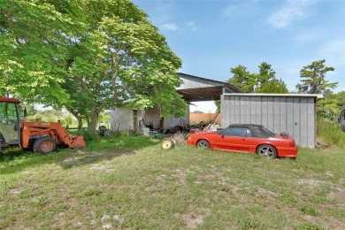 Peaceful Country Setting with City Access - Osteen, FL . This on Cypress Point RV Golf Club in Florida - for sale on GolfHomes.com, golf home, golf lot