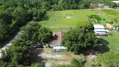Peaceful Country Setting with City Access - Osteen, FL . This on Cypress Point RV Golf Club in Florida - for sale on GolfHomes.com, golf home, golf lot