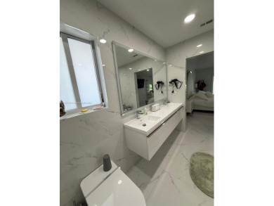 Desirable location COUNTRY CLUB OF MIAMI with stunning golf on  in Florida - for sale on GolfHomes.com, golf home, golf lot