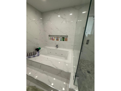 Desirable location COUNTRY CLUB OF MIAMI with stunning golf on  in Florida - for sale on GolfHomes.com, golf home, golf lot