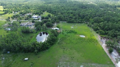 Peaceful Country Setting with City Access - Osteen, FL . This on Cypress Point RV Golf Club in Florida - for sale on GolfHomes.com, golf home, golf lot