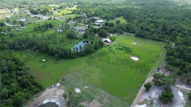 Peaceful Country Setting with City Access - Osteen, FL . This on Cypress Point RV Golf Club in Florida - for sale on GolfHomes.com, golf home, golf lot