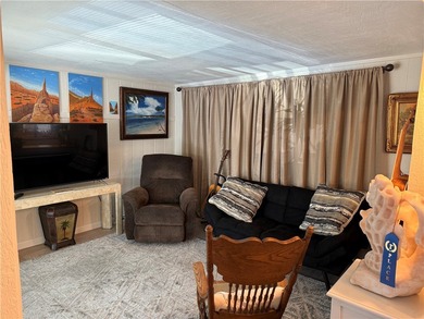 2 bedroom 1 bath with covered deck and parking. Newly remodeled on Riverview Golf Course in Arizona - for sale on GolfHomes.com, golf home, golf lot