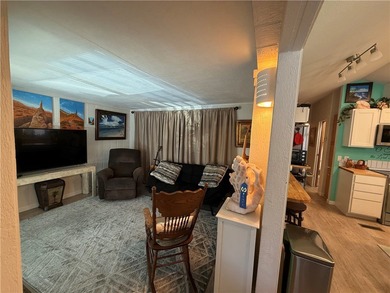 2 bedroom 1 bath with covered deck and parking. Newly remodeled on Riverview Golf Course in Arizona - for sale on GolfHomes.com, golf home, golf lot