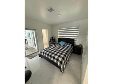 Desirable location COUNTRY CLUB OF MIAMI with stunning golf on  in Florida - for sale on GolfHomes.com, golf home, golf lot