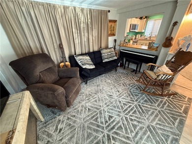 2 bedroom 1 bath with covered deck and parking. Newly remodeled on Riverview Golf Course in Arizona - for sale on GolfHomes.com, golf home, golf lot