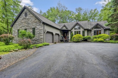 Welcome to your dream home, ideally situated on the 5th hole of on Split Rock Resort and Country Club in Pennsylvania - for sale on GolfHomes.com, golf home, golf lot