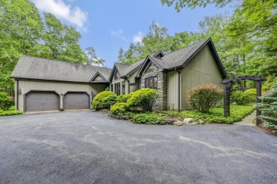 Welcome to your dream home, ideally situated on the 5th hole of on Split Rock Resort and Country Club in Pennsylvania - for sale on GolfHomes.com, golf home, golf lot