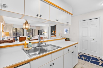 Beautifully decorated and furnished with upscale furnishings and on Pawleys Plantation Golf and Country Club in South Carolina - for sale on GolfHomes.com, golf home, golf lot