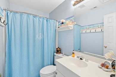 Beautifully decorated and furnished with upscale furnishings and on Pawleys Plantation Golf and Country Club in South Carolina - for sale on GolfHomes.com, golf home, golf lot