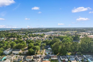 Located in the heart of North Myrtle Beach's beloved Ocean Drive on Beachwood Golf Club in South Carolina - for sale on GolfHomes.com, golf home, golf lot
