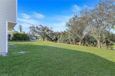 Nestled in a tranquil waterfront setting, 1237 Harbor Blvd, Port on Port Charlotte Golf Club in Florida - for sale on GolfHomes.com, golf home, golf lot