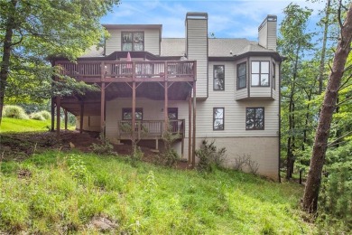 Welcome to your next dream home, a stunning 4-bedroom, 2 on The Highlands Course at Lake Arrowhead in Georgia - for sale on GolfHomes.com, golf home, golf lot