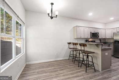 Welcome to this beautiful modern ranch-style home in the on Turtle Cove Golf Course in Georgia - for sale on GolfHomes.com, golf home, golf lot