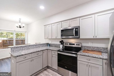 Welcome to this beautiful modern ranch-style home in the on Turtle Cove Golf Course in Georgia - for sale on GolfHomes.com, golf home, golf lot