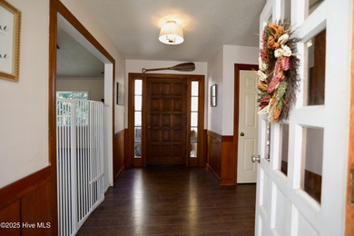 Excellent price on updated golf front beauty! Located just on Seven Lakes Country Club in North Carolina - for sale on GolfHomes.com, golf home, golf lot