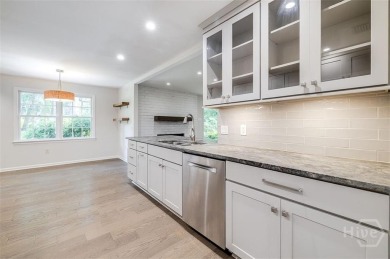Fully renovated, one-level mid-century brick home overlooking on Wilmington Island Club in Georgia - for sale on GolfHomes.com, golf home, golf lot