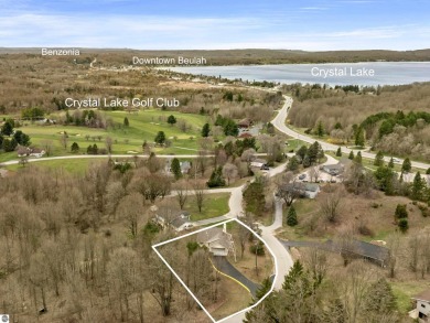 Nice 2 bedroom, 2 bath home that has seasonal views of Crystal on Crystal Lake Golf Club in Michigan - for sale on GolfHomes.com, golf home, golf lot