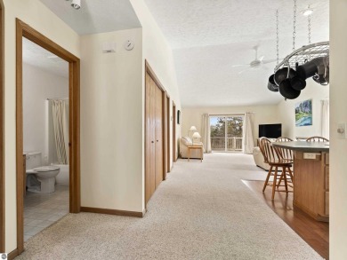 Nice 2 bedroom, 2 bath home that has seasonal views of Crystal on Crystal Lake Golf Club in Michigan - for sale on GolfHomes.com, golf home, golf lot