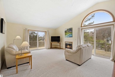 Nice 2 bedroom, 2 bath home that has seasonal views of Crystal on Crystal Lake Golf Club in Michigan - for sale on GolfHomes.com, golf home, golf lot